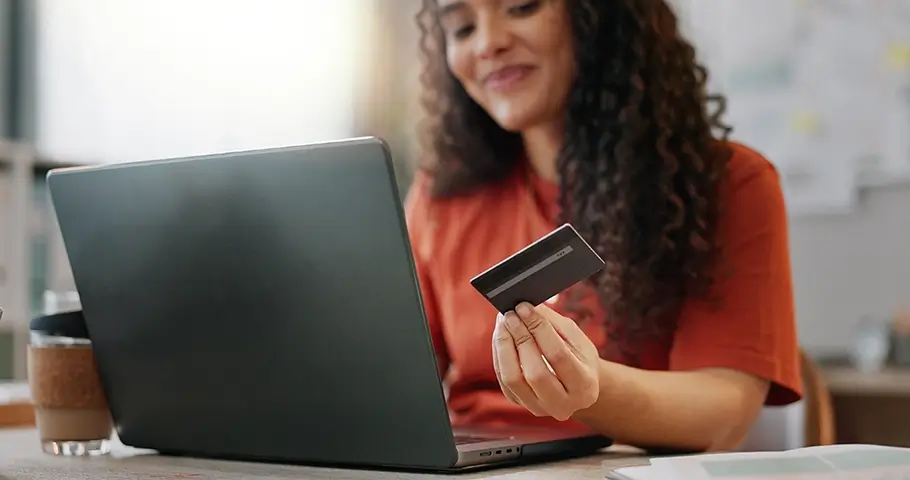 Photo of Woman Holding Credit Card